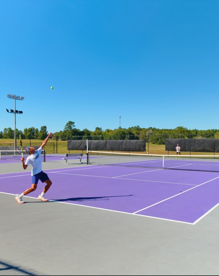 The purple tennis court at MGA's Macon campus